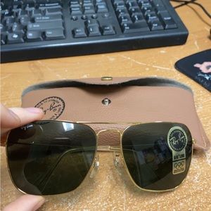 Ray bans sunglasses with sticker still on it